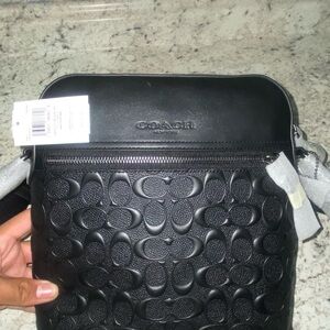 Black Woman’s Crossbody Coach Bag